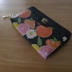 Juicy Couture zip wallet. Key charm, crown, juicy fun design. 7.25"x4". $24.